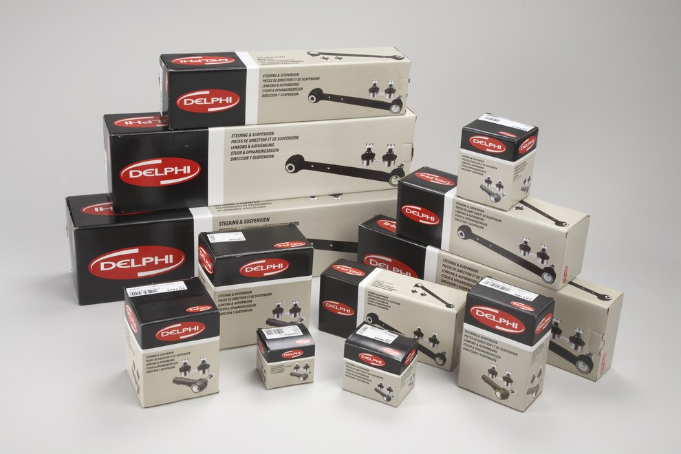 A selection of steering and suspension packaging including tie rod ends and ball joints.